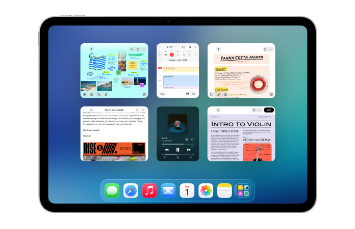 橫屏放置的 iPad，顯示六個打開的窗口，排列成兩行，包括日歷 app、備忘錄 app、Apple Music 和 Safari 瀏覽器等。